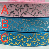 Foil embossed grosgrain ribbon and/or coordinating 1" flatbacks.  Perfect for bow making and many other crafts.