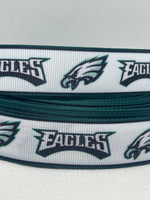 PHILADELPHIA EAGLES inspired grosgrain ribbon and/or coordinating 1" flatbacks.  Perfect for bow making and many other crafts.