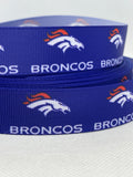 Denver Broncos inspired 7/8" & 1.5" grosgrain ribbon and/or coordinating 1" flatbacks.  Perfect for bow making and many other crafts.