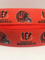 Cincinnati  Bengals inspired grosgrain ribbon and/or coordinating 1" flatbacks.  Perfect for bow making and many other crafts.