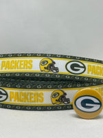 Green Bay Packers inspired grosgrain ribbon and/or coordinating 1" flatbacks.  Perfect for bow making and many other crafts.