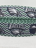 Philadelphia Eagles inspired grosgrain ribbon and/or coordinating 1" flatbacks.  Perfect for bow making amd many other crafts.