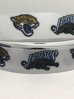 JACKSONVILLE JAGUARS inspired grosgrain ribbon and/or coordinating 1" flatbacks.  Perfect for bow making and many other crafts.