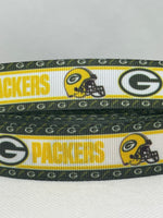 Green Bay Packers inspired grosgrain ribbon and/or coordinating 1" flatbacks.  Perfect for bow making and many other crafts.