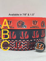 Cincinnati  Bengals inspired grosgrain ribbon and/or coordinating 1" flatbacks.  Perfect for bow making and many other crafts.