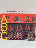 Cincinnati  Bengals inspired grosgrain ribbon and/or coordinating 1" flatbacks.  Perfect for bow making and many other crafts.