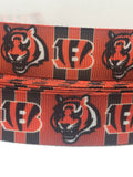 Cincinnati Bengals inspired grosgrain ribbon and/or coordinating 1" flatbacks.  Perfect for bow making and many other crafts.