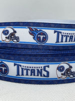 Tennessee Titans inspired grosgrain ribbon and/or coordinating 1" flatbacks.  Perfect for bow making and many other crafts.