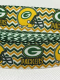 Green Bay Packers 7/8" or 1.5" inspired grosgrain ribbon and/or coordinating 1" flatbacks.  Perfect for bow making and many other crafts.