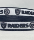 LAS VEGAS RAIDERS inspired grosgrain ribbon and/or coordinating 1" flatbacks. Perfect for bow making and many other crafts.