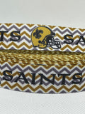 New Orleans Saints inspired grosgrain ribbon and/or coordinating 1" flatbacks. Perfect for making bows and many other crafts.