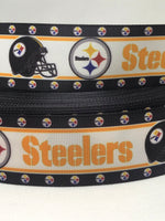 Pittsburgh Steelers inspired grosgrain ribbon and/or coordinating 1" flatbacks.  Perfect for bow making and many other crafts.