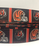 Cincinnati Bengals inspired grosgrain ribbon and/or coordinating 1" flatbacks.  Perfect for bow making and many other crafts.