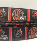 Cincinnati Bengals inspired grosgrain ribbon and/or coordinating 1" flatbacks.  Perfect for bow making and many other crafts.