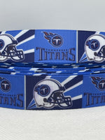 Tennessee Titans inspired grosgrain ribbon and/or coordinating 1" flatbacks.  Perfect for bow making and many other crafts.