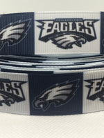 Philadelphia Eagles inspired grosgrain ribbon and/or coordinating 1" flatbacks.  Perfect for bow making amd many other crafts.