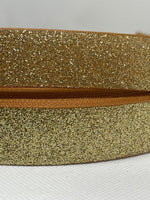 Solid glittered grosgrain ribbon.  Perfect for bow making and many other crafts.